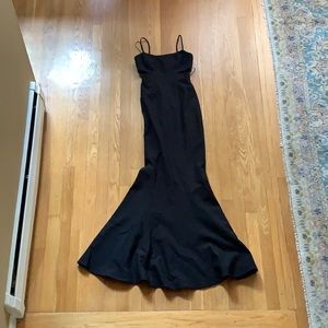 Size 0 Likely NWT black gown with side cutout